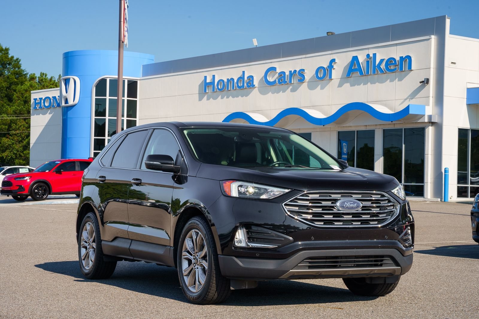 Used 2024 Black Ford Titanium image 1