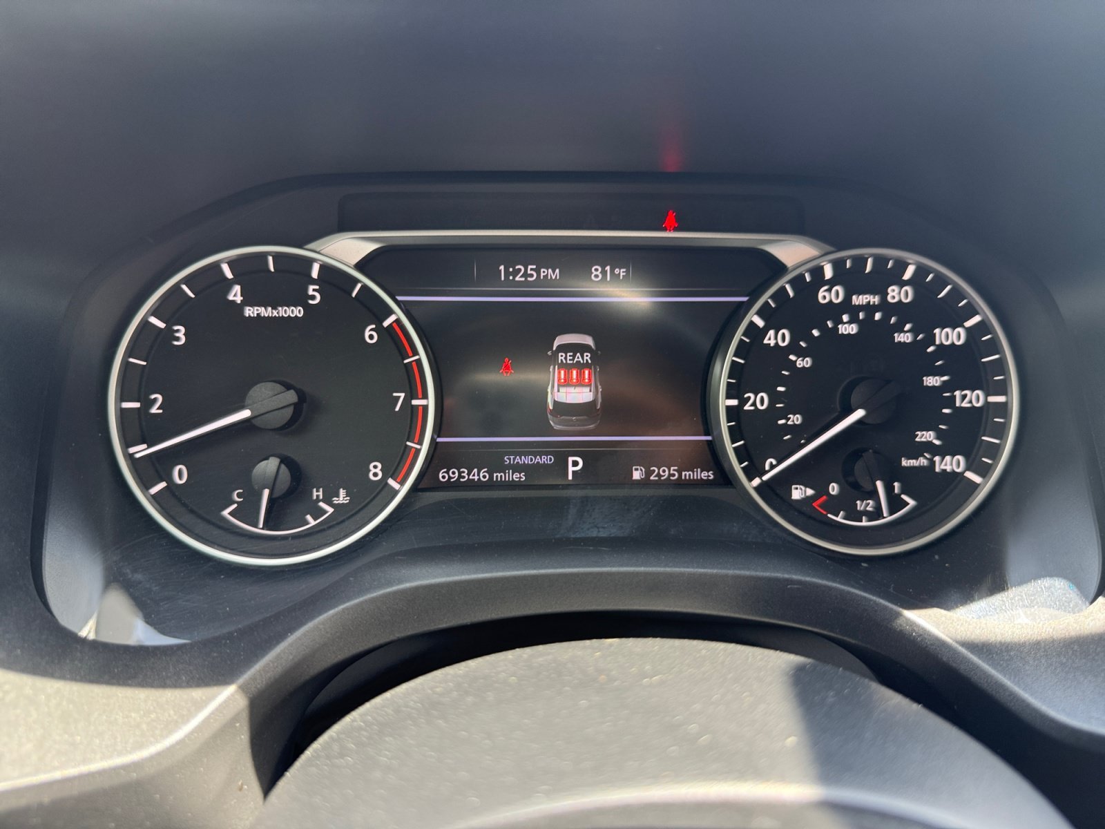Used 2024 Gun Metallic Nissan SV image 11