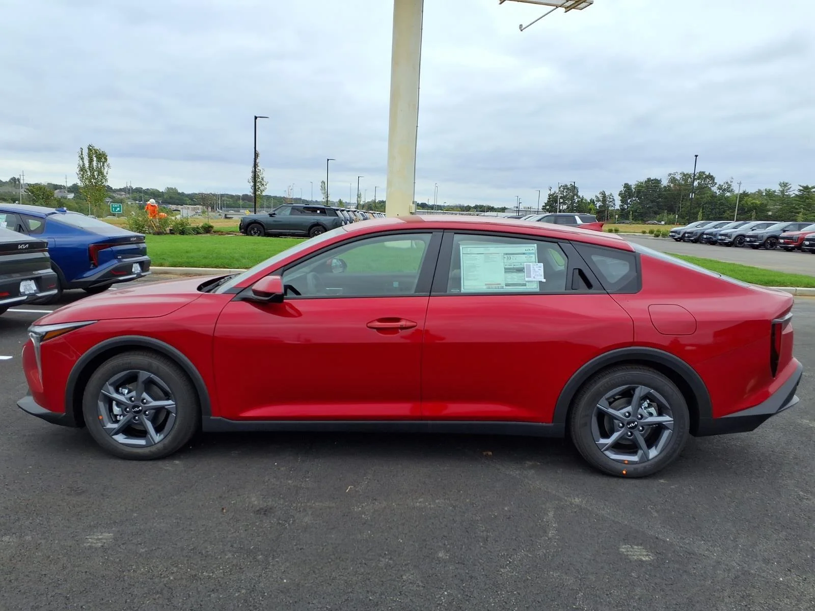 New 2026 Currant Red Kia LXS image 16