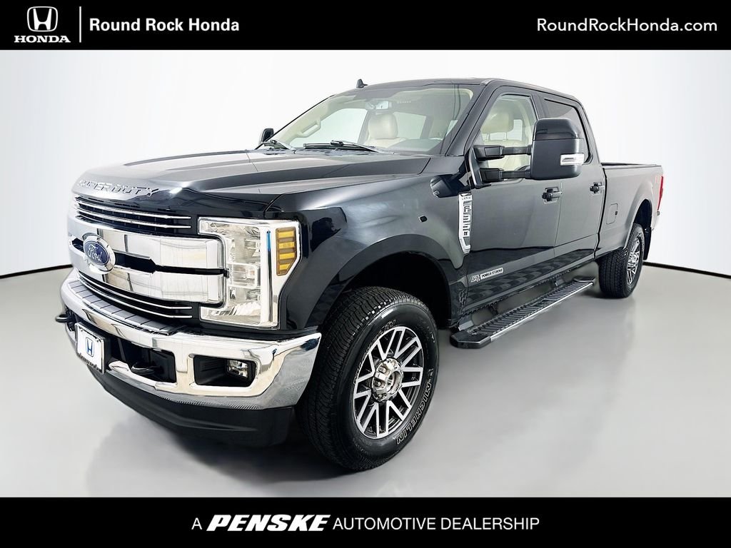 Used 2019 Black Metallic Ford Lariat image 1