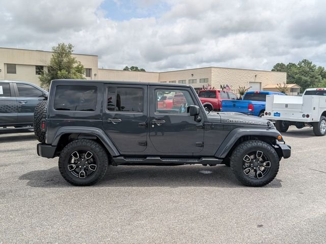 Used 2017 Black Jeep Unlimited Sahara image 7
