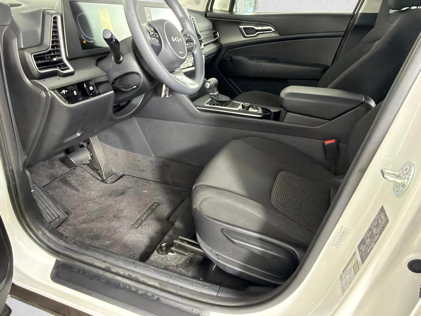 Used 2025 Snow White Pearl Kia LX image 9