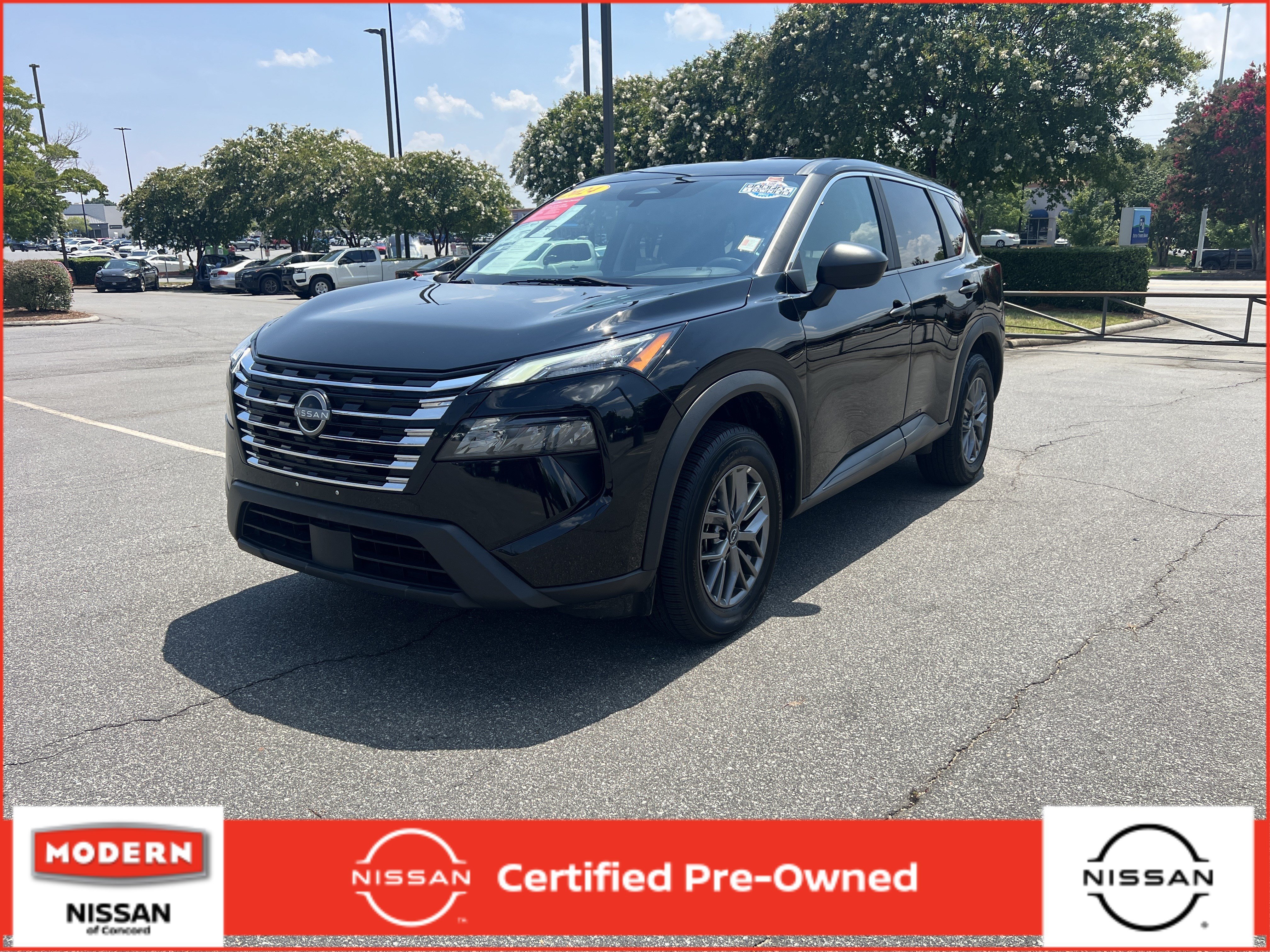 Certified Used 2024 Super Black Nissan S image 1