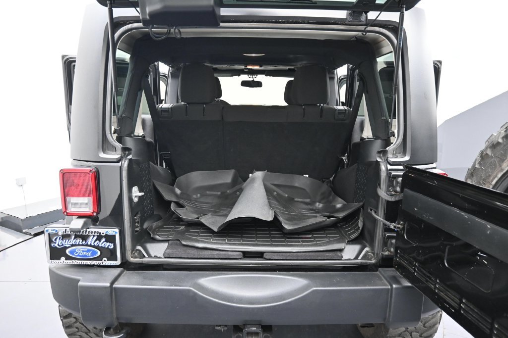 Used 2014 Black Clearcoat Jeep Unlimited Sport image 30