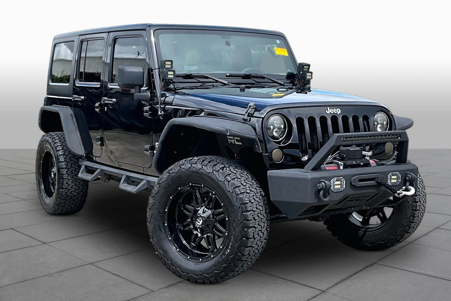 Used 2014 Black Clearcoat Jeep Sport image 3