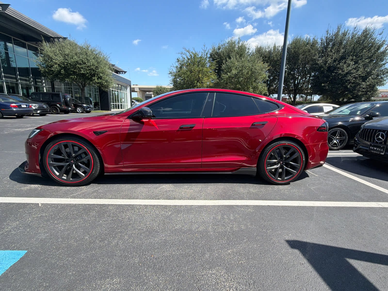 Used 2023 Red Multi-Coat Tesla  image 3