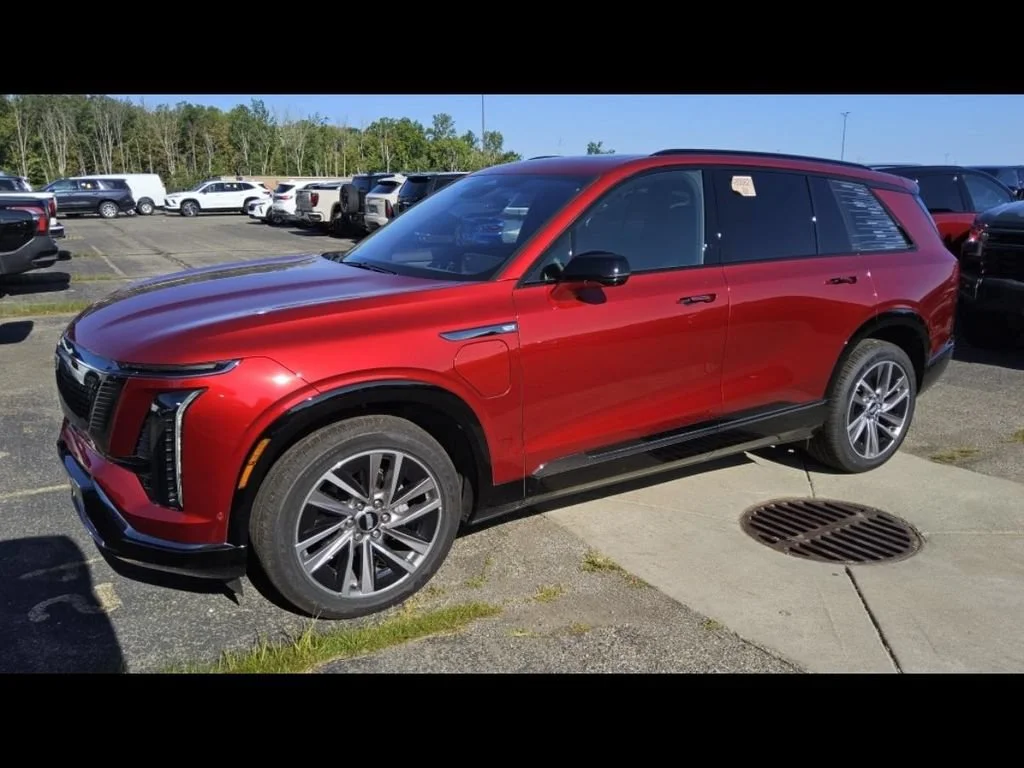 Used 2026 Radiant Red Tintcoat Cadillac Sport image 1