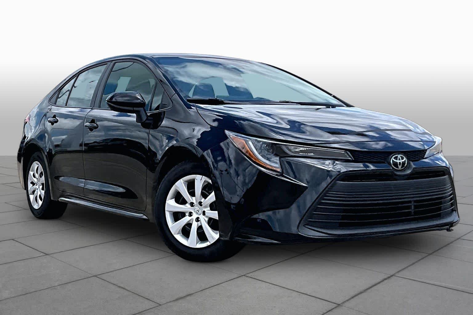 Used 2024 Midnight Black Metallic Toyota LE image 3