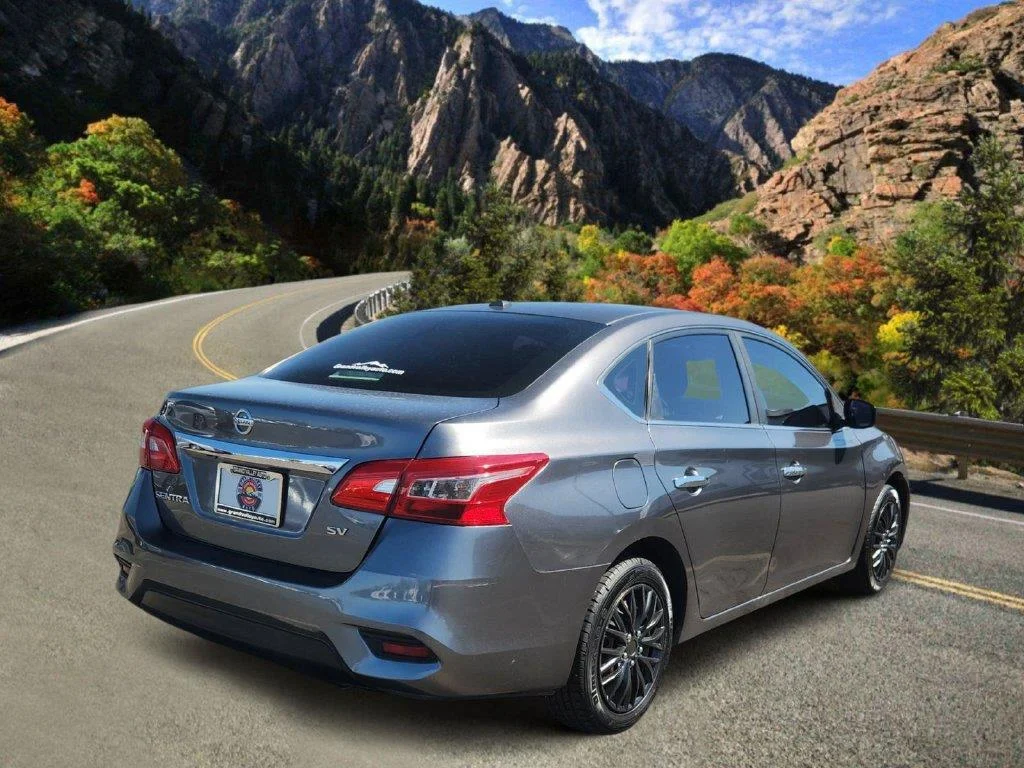 Used 2017 Gun Metallic Nissan SV image 3