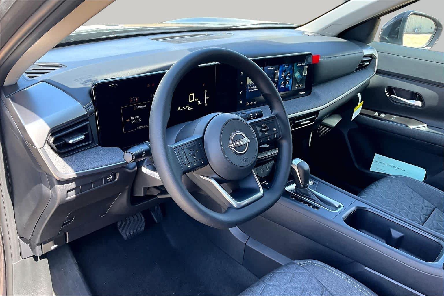 New 2026 Gun Metallic Nissan SV image 10