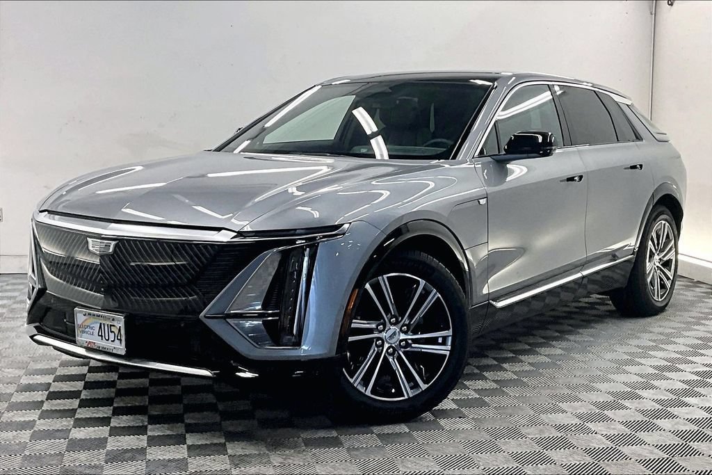 Used 2024 Argent Silver Metallic Cadillac Luxury 1 image 1