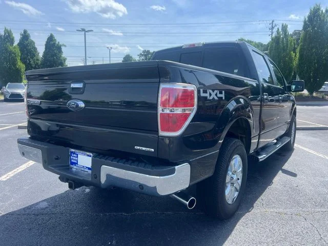 Used 2014 Tuxedo Black Metallic Ford XLT image 6