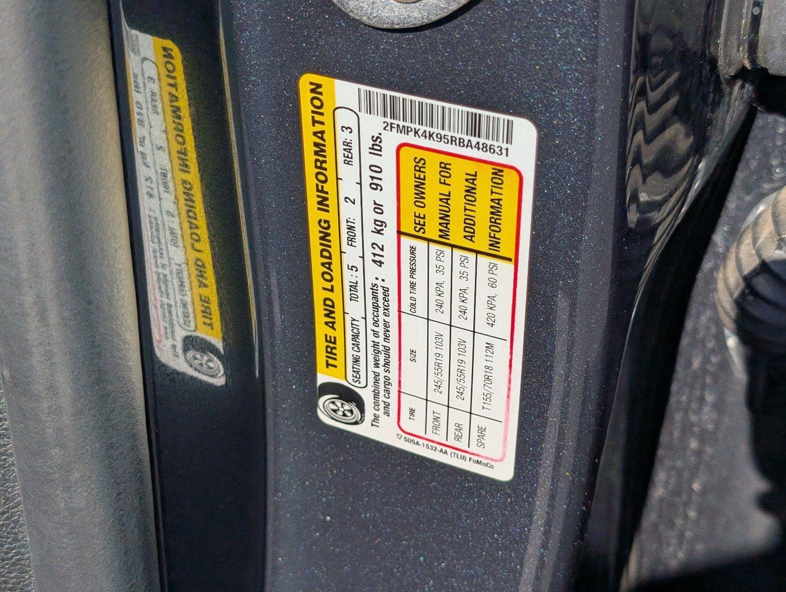 Used 2024 Stone Blue Ford Titanium image 15