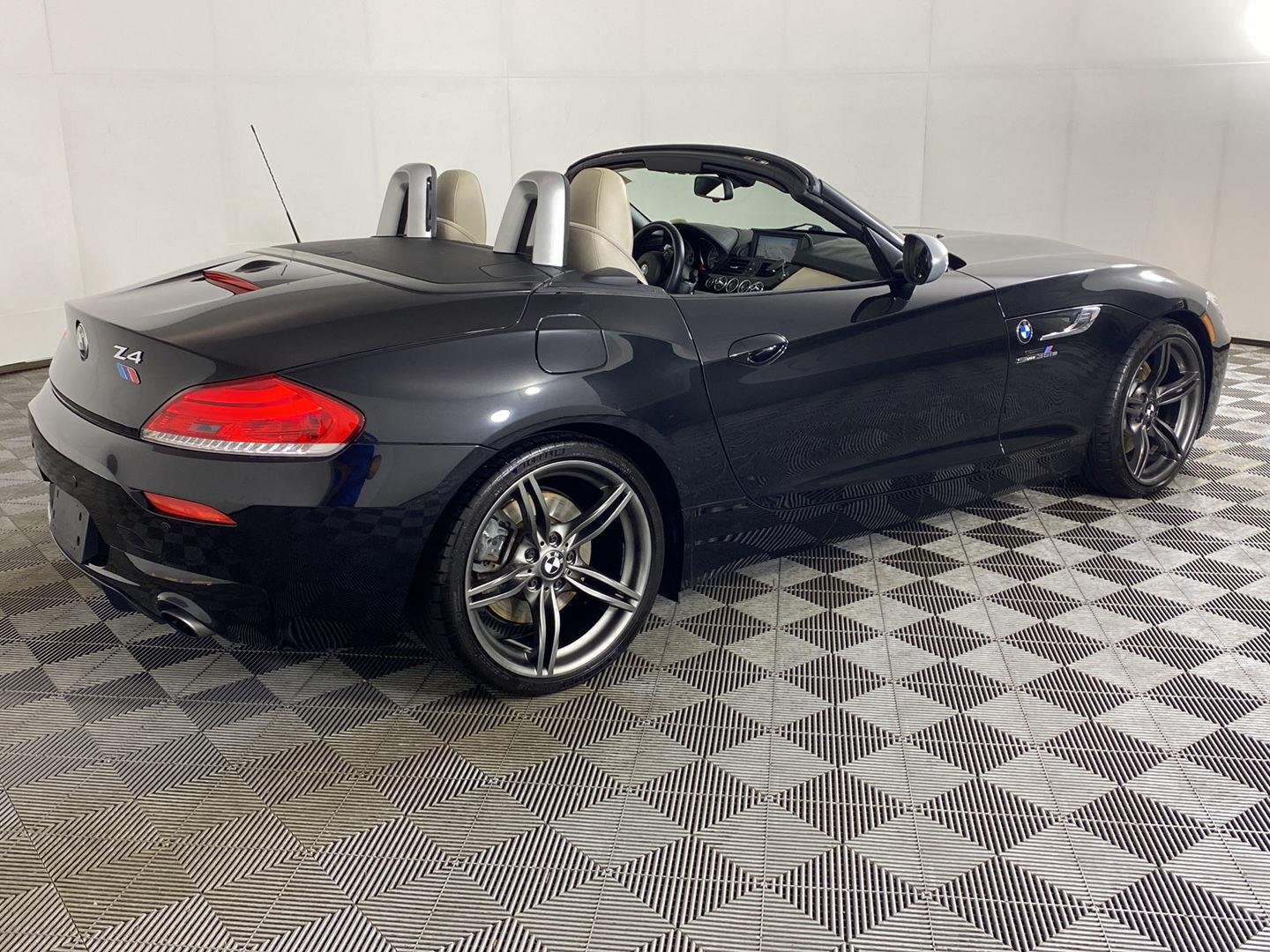 Used 2011 Black Sapphire Metallic BMW sDrive35is image 23
