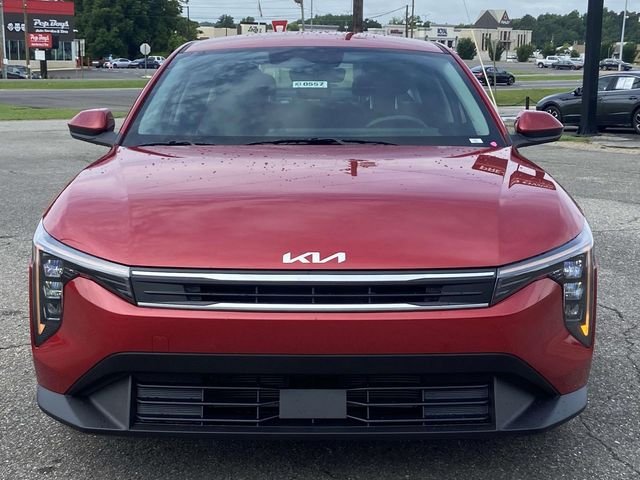 New 2026 Currant Red Kia LXS image 6