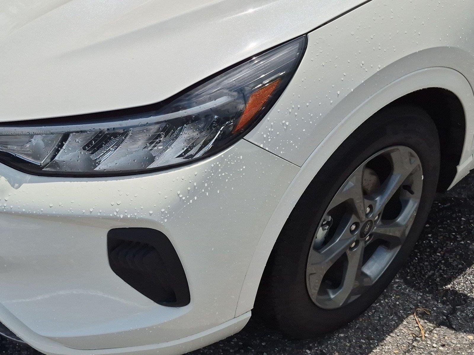 Used 2024 Star White Metallic Tri-Coat Ford ST-Line image 9