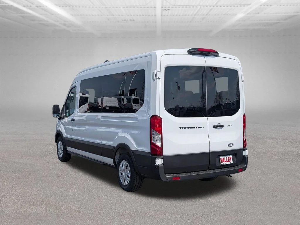 New 2026 Oxford White Ford Passenger Van XLT image 9