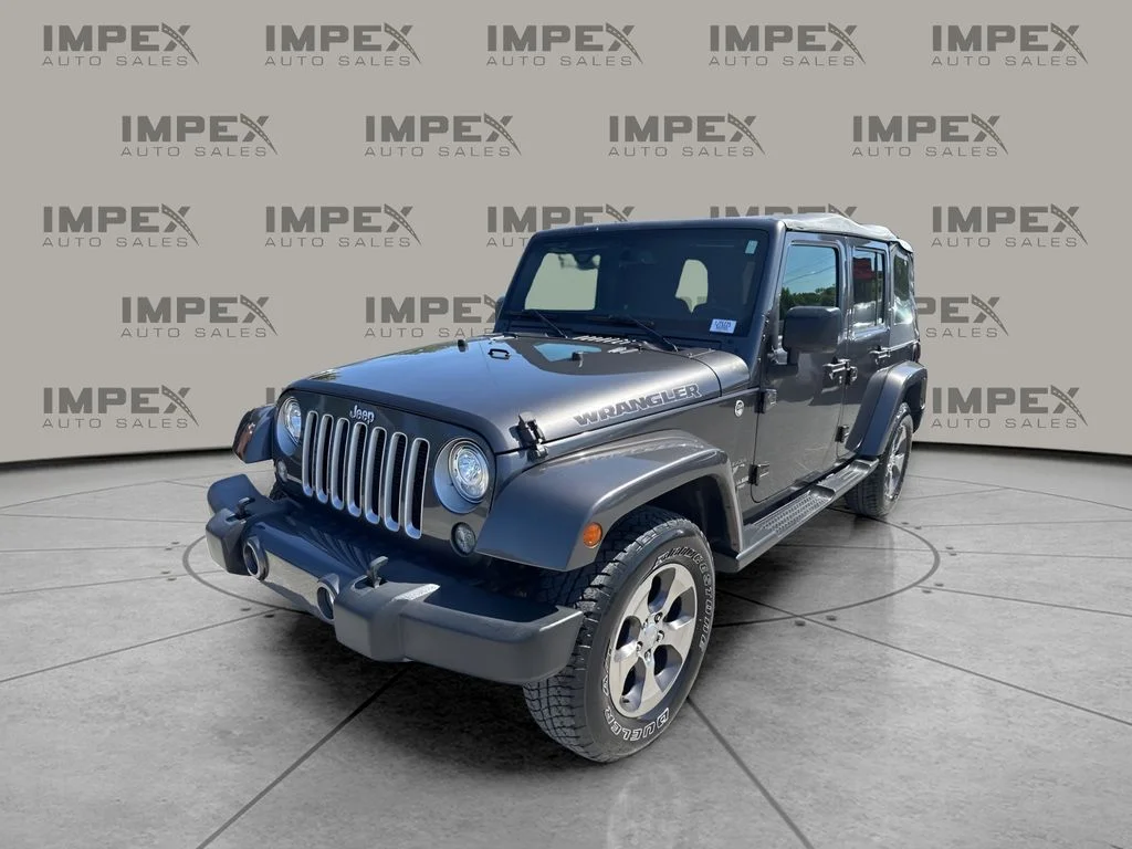 Used 2017 Gray Jeep Unlimited Sahara image 1