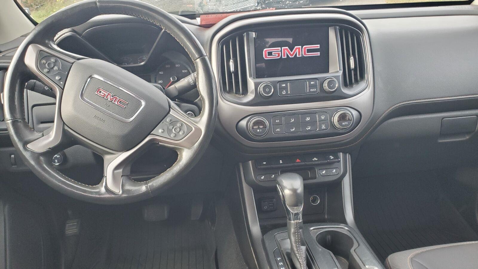 Used 2022 DESERT SAND METALLIC GMC 4WD AT4 w/Cloth image 7