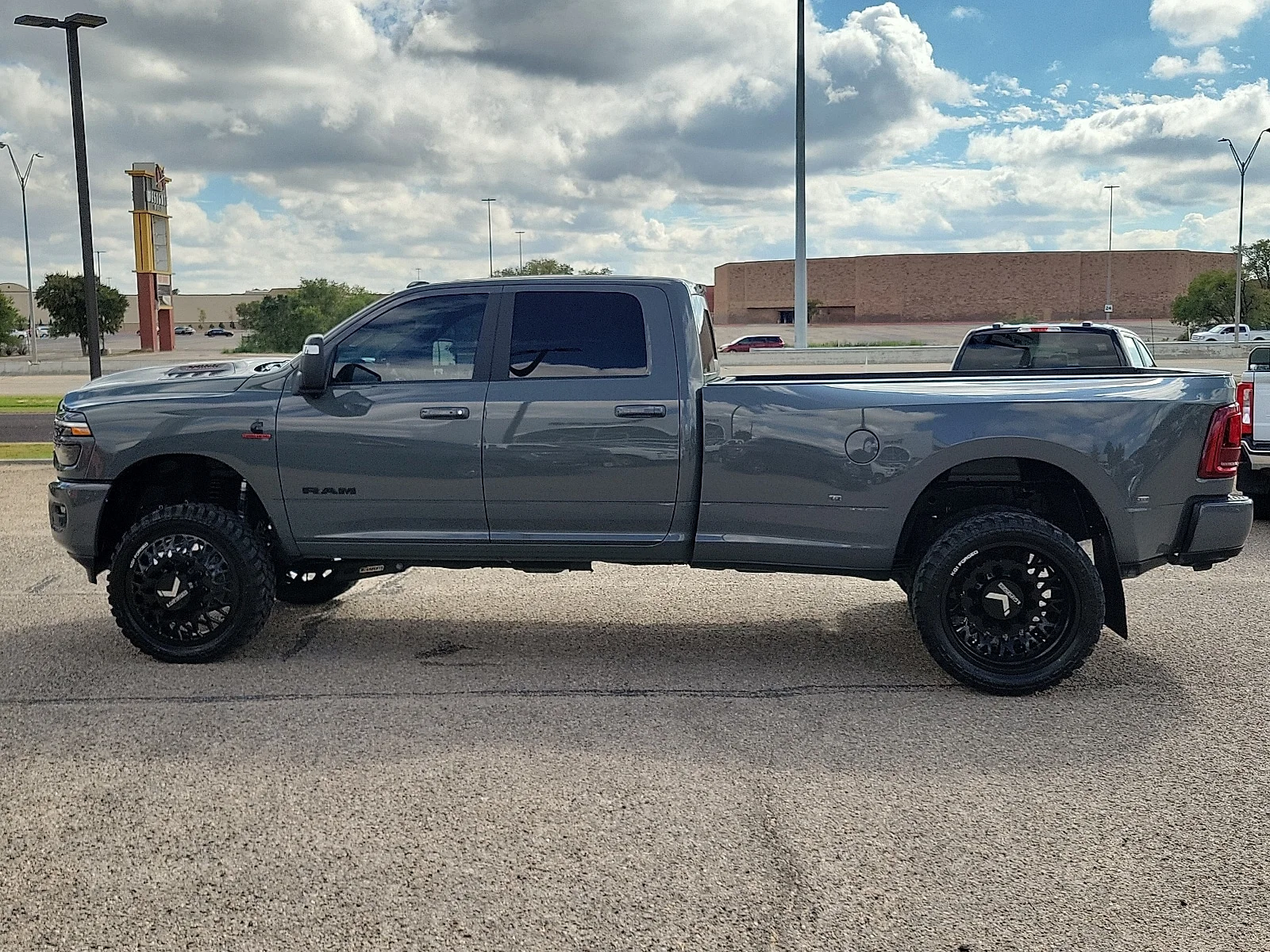 New 2026 Ceramic Gray Ram LARAMIE CREW CAB 4X4 8