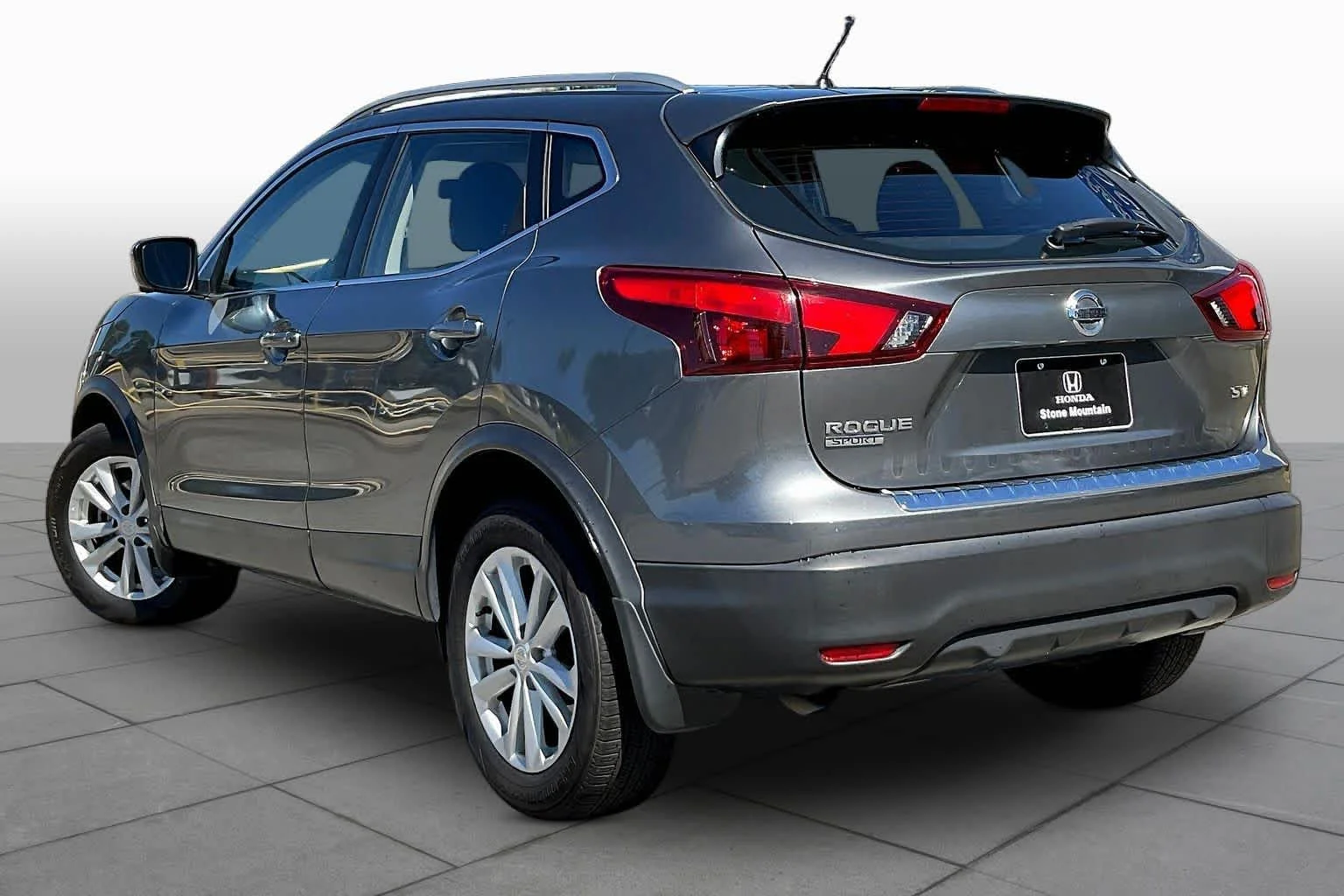 Used 2018 Gun Metallic Nissan SV image 12