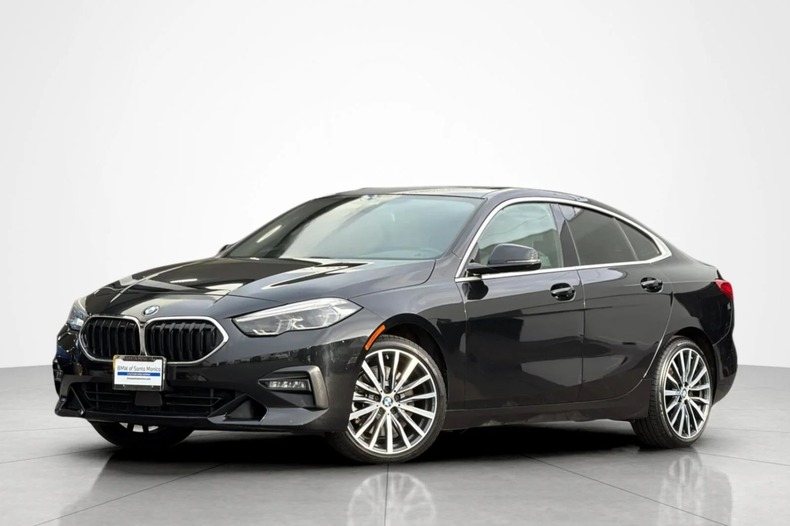 Used 2020 Black Sapphire Metallic BMW 228i xDrive image 1
