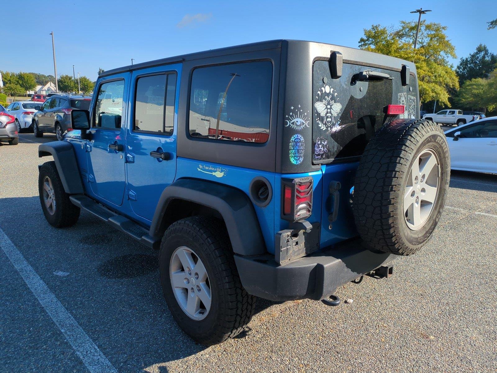 Used 2015 Hydro Blue Pearl Coat Jeep Sport image 5