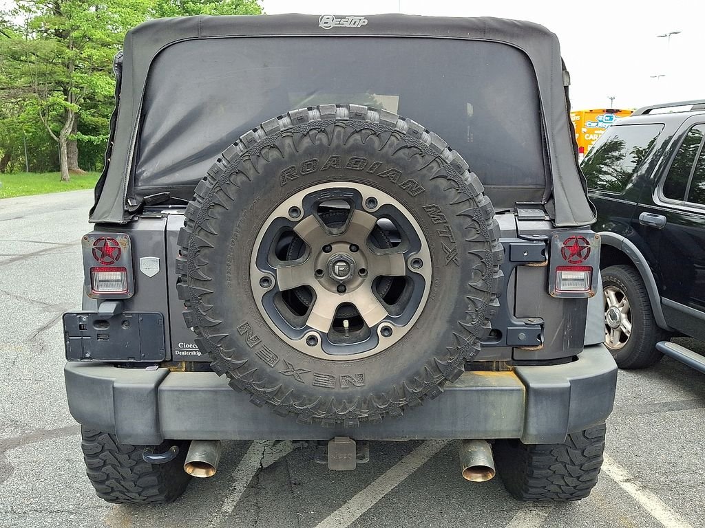 Used 2016 Gray Jeep Sport image 6