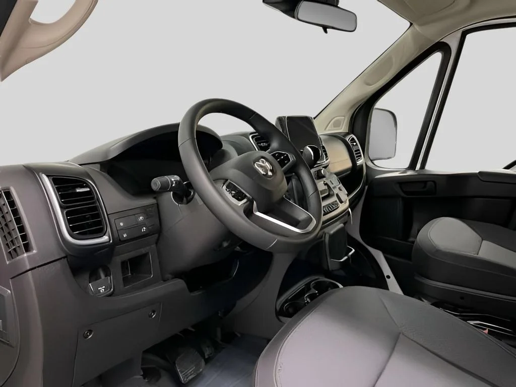 Used 2025 Bright White Clearcoat Ram SLT image 11