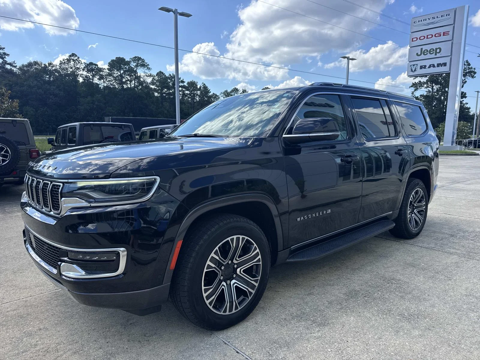 Used 2022 Diamond Black Crystal Pearlcoat Jeep Series III 4x2 image 3