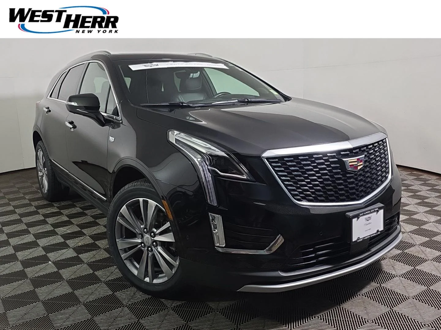 Used 2024 Stellar Black Metallic Cadillac AWD Premium Luxury image 1