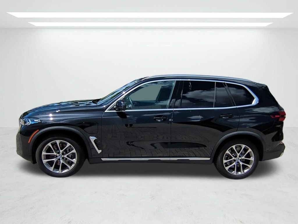 New 2026 Black Sapphire Metallic BMW xDrive50e image 7