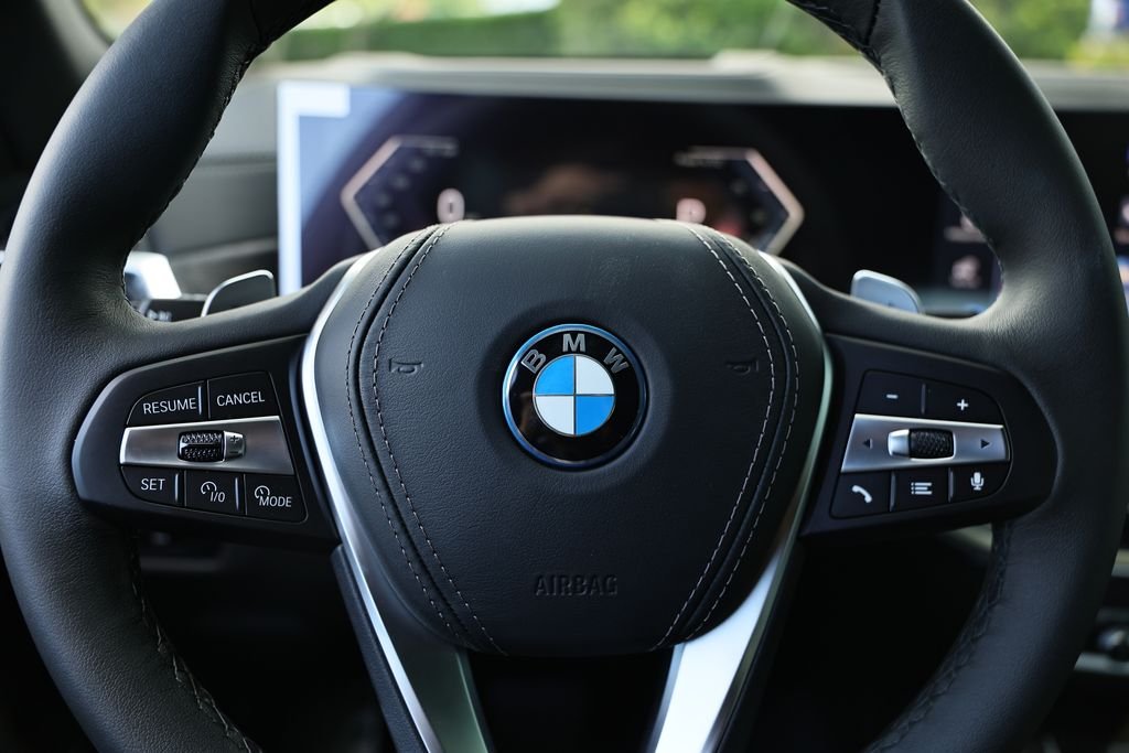 New 2026 Black Sapphire Metallic BMW xDrive50e image 33