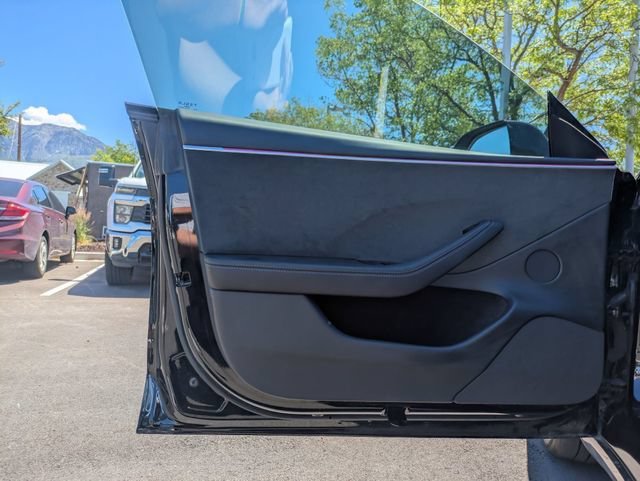 Used 2025 Solid Black Tesla Long Range image 12