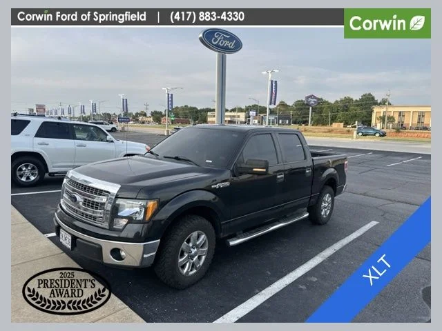 Used 2013 Tuxedo Black Metallic Ford XLT image 1
