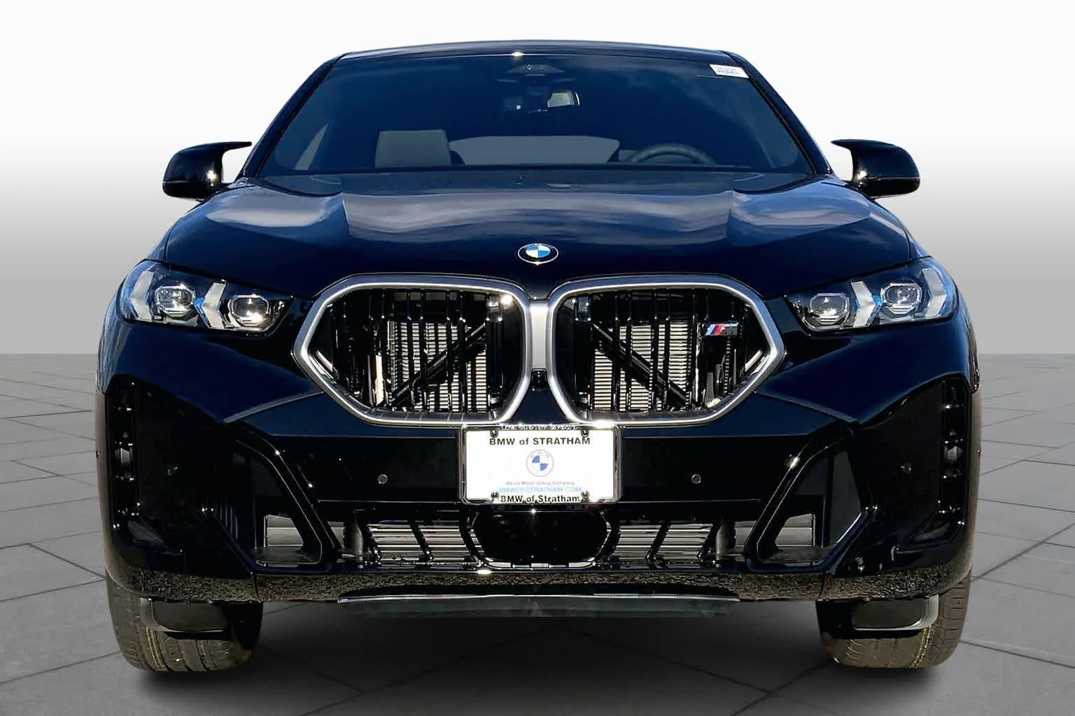 New 2026 Black Sapphire Metallic BMW M60i image 3
