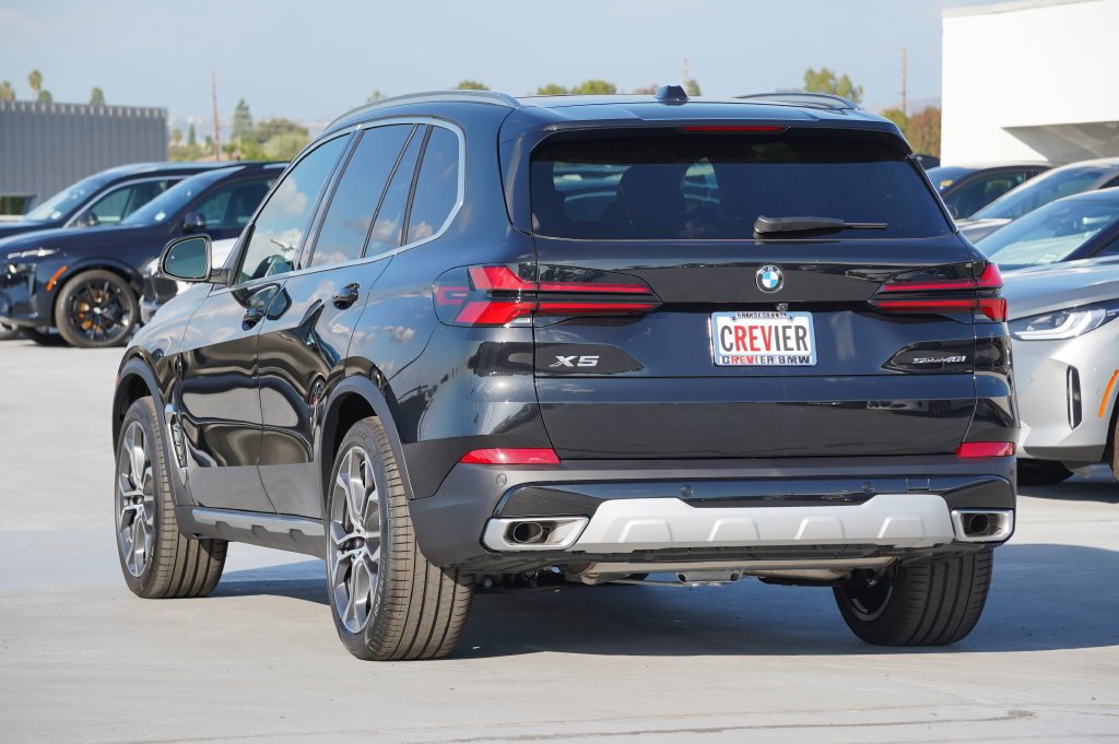 Used 2026 Black Sapphire Metallic BMW sDrive40i image 7