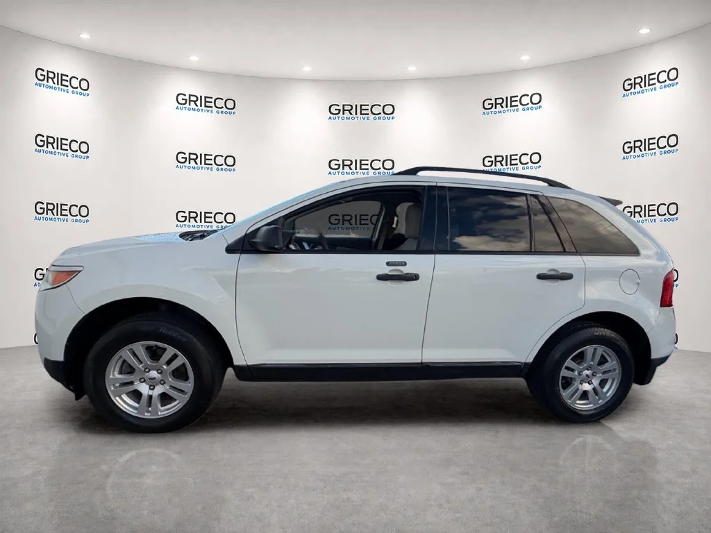 Used 2011 White Suede Ford SE image 4