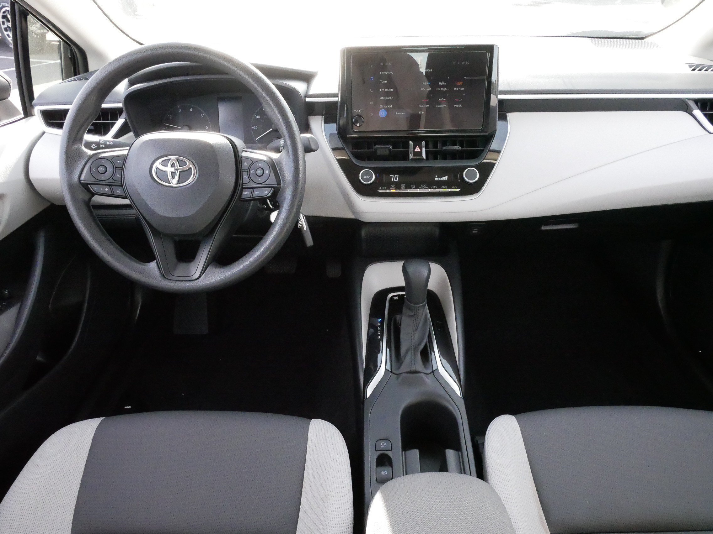 Used 2025 Midnight Black Metallic Toyota Hybrid LE image 10