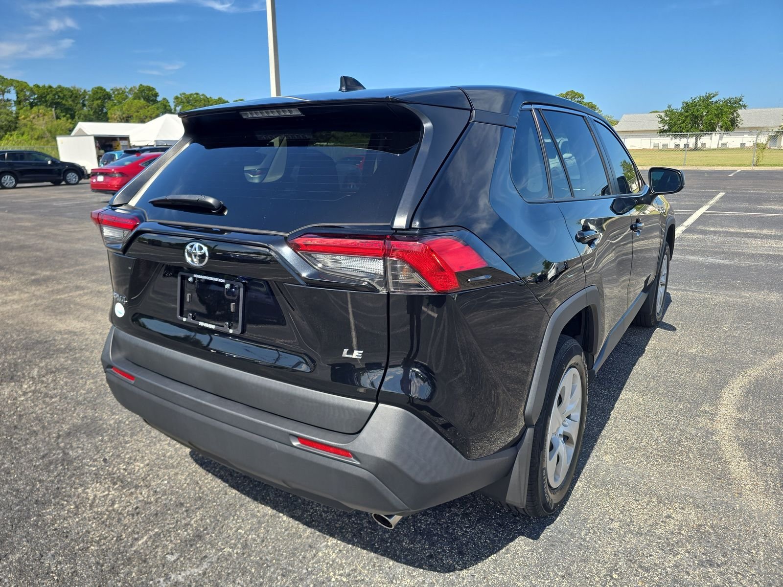 Used 2024 Black Toyota LE image 4