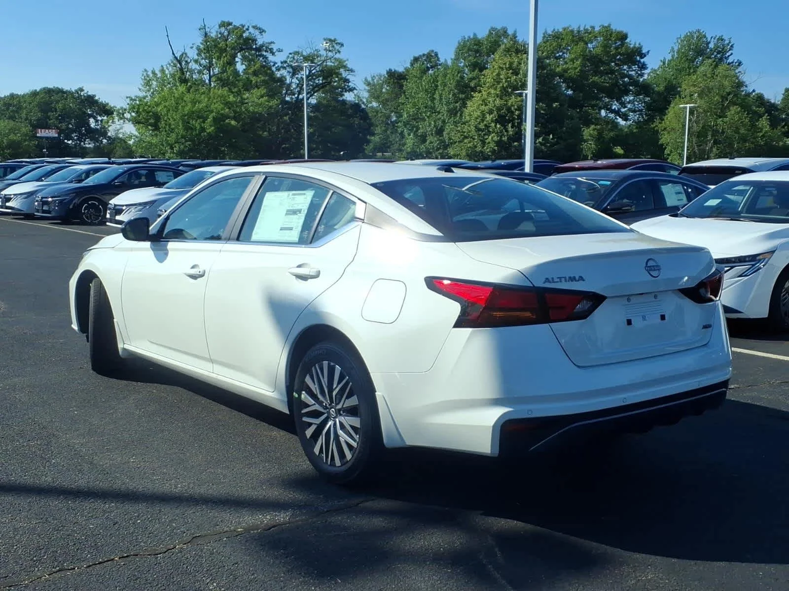 New 2026 Pearl White Tricoat Nissan SV image 3