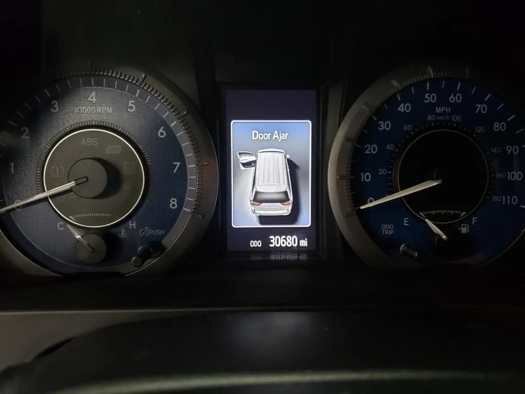Used 2020 Celestial Silver Metallic Toyota LE image 23
