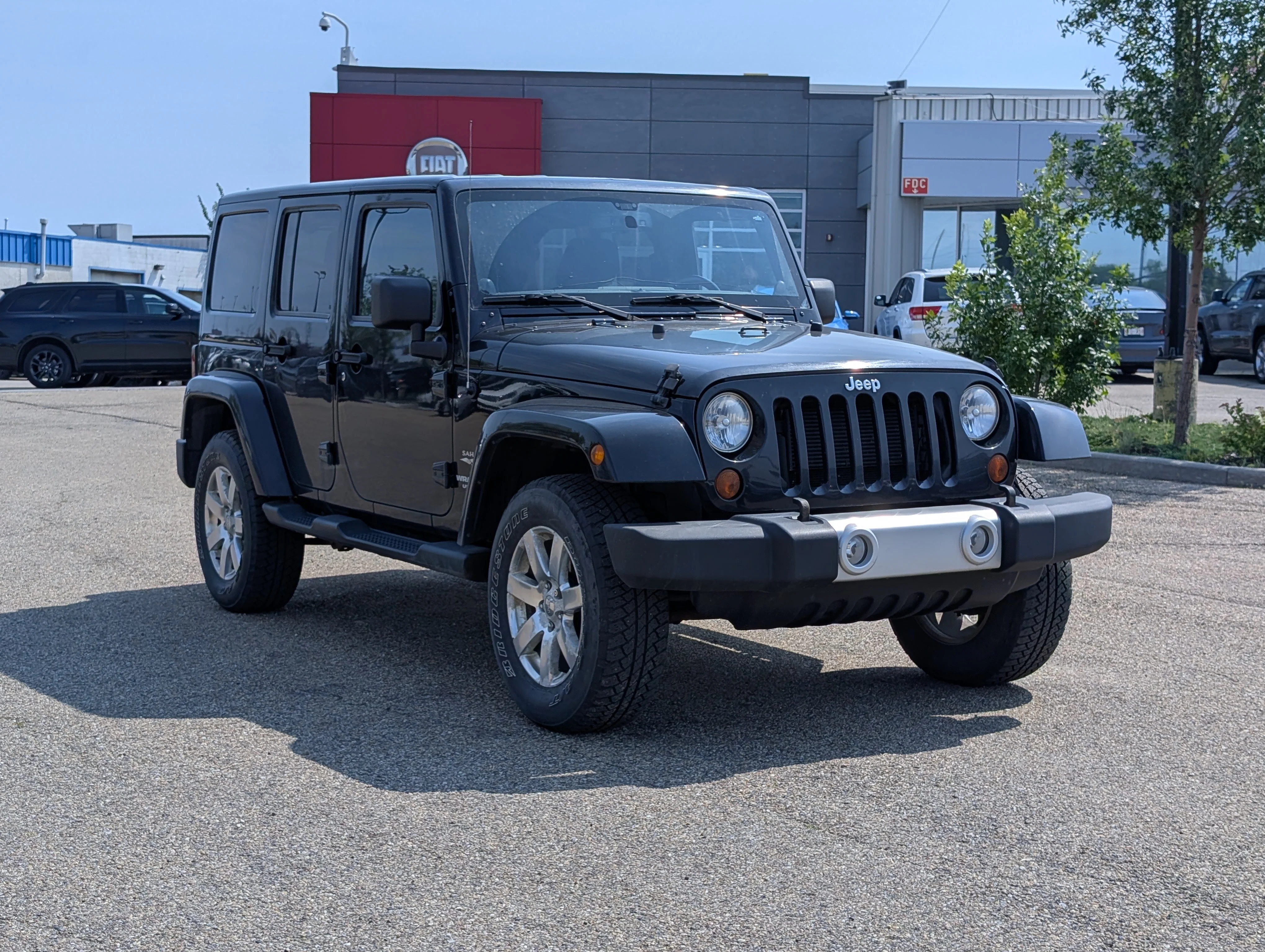 Used 2013 Black Jeep Sahara image 7