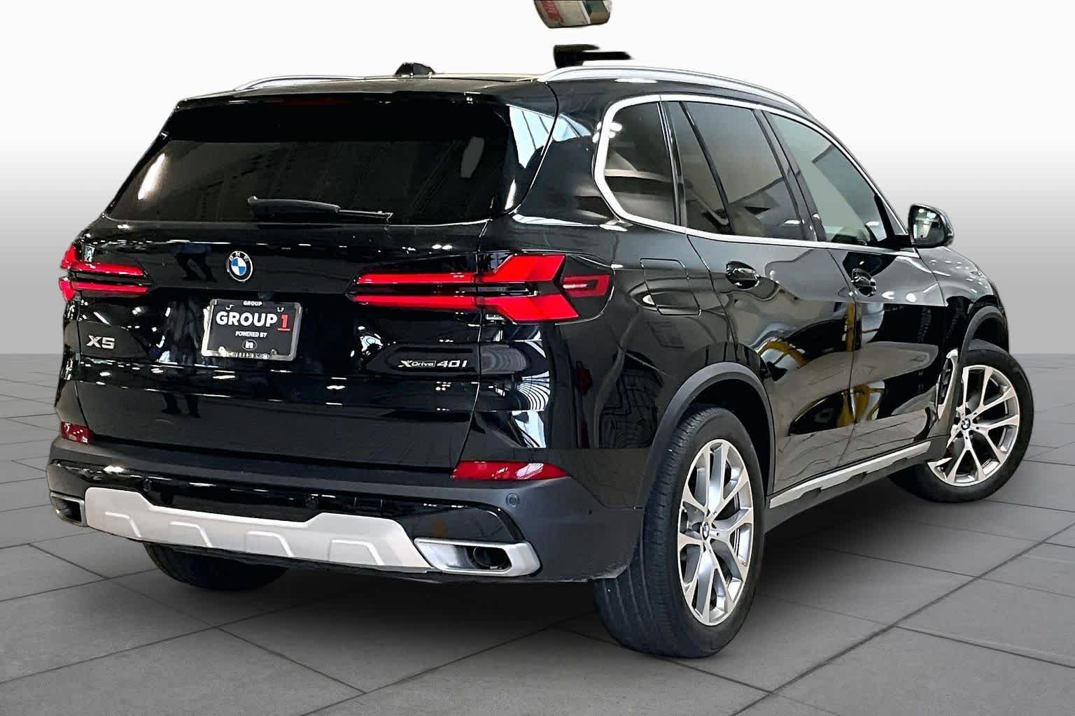 Used 2024 Black Sapphire Metallic BMW xDrive40i image 13