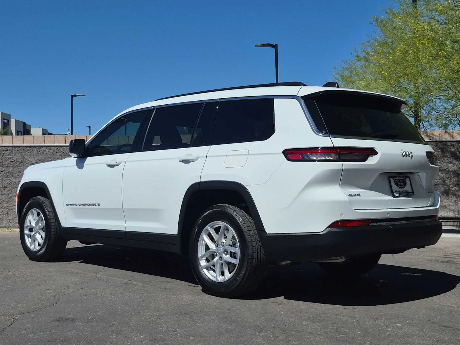 Used 2025 Bright White Clearcoat Jeep Laredo image 6