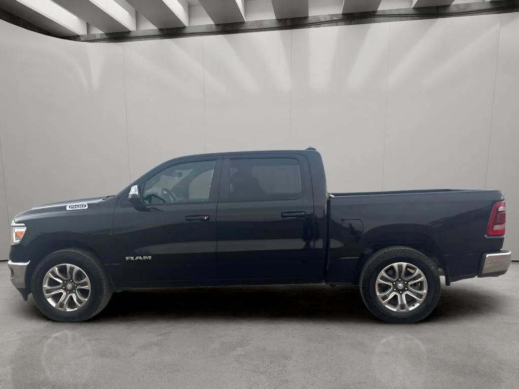 Used 2024 Diamond Black Crystal Pearlcoat Ram Laramie image 1