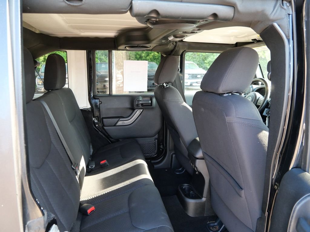 Used 2013 Black Jeep Unlimited Sport image 12