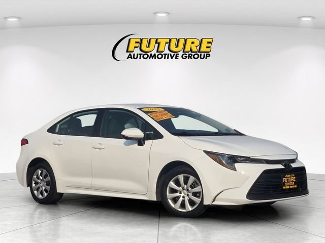 Used 2025 White Toyota LE image 1