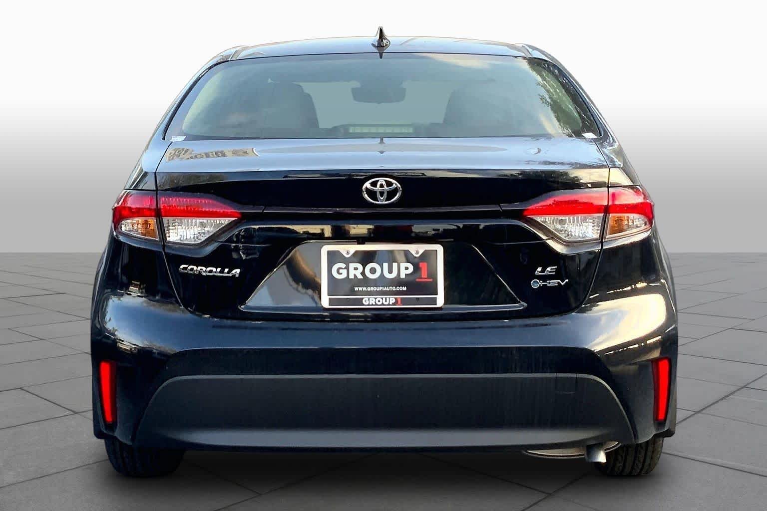 Used 2026 Midnight Black Metallic Toyota Hybrid LE image 5