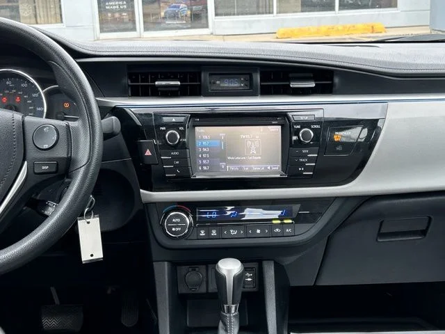 Used 2016 Barcelona Red Metallic Toyota LE image 23